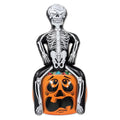Party Central Pack of 6 Black and Orange Inflatable Skeleton Party Pooper on Pumpkin Outdoor